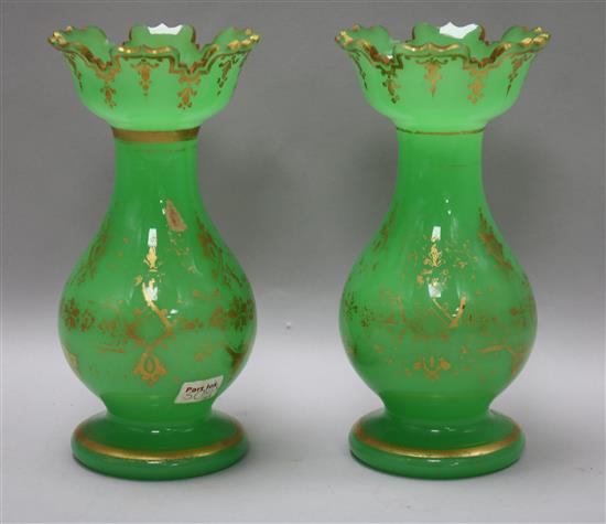 A pair of Victorian green glass vases H.20cm